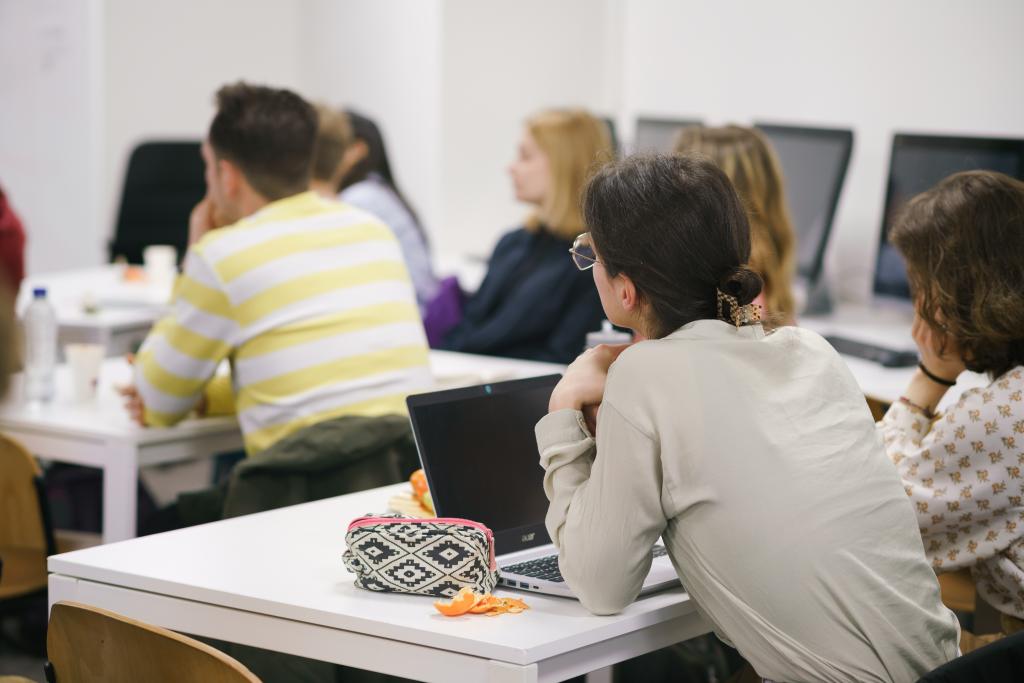 Students listening at workshop